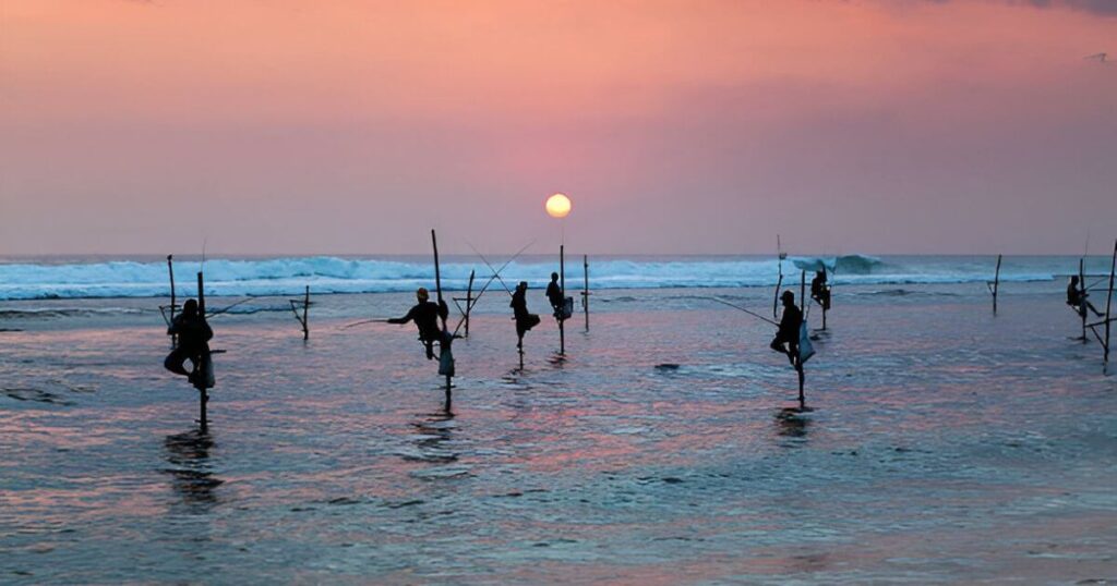 Fishermen at the sunset near Galle