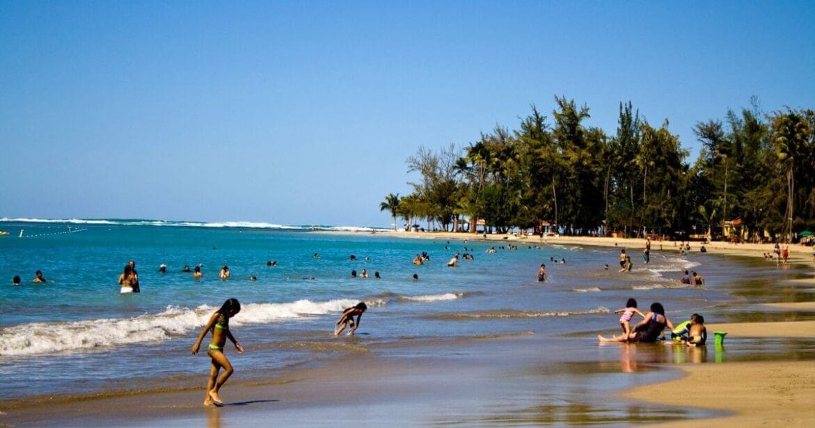 swimming and sunbathing the Luquillo Beach  In Puerto Rico